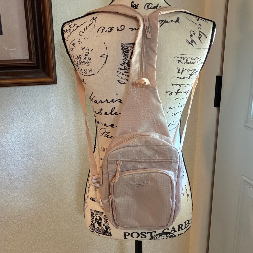 Reebok Light Pink Backpack/sling bag-like new condition.